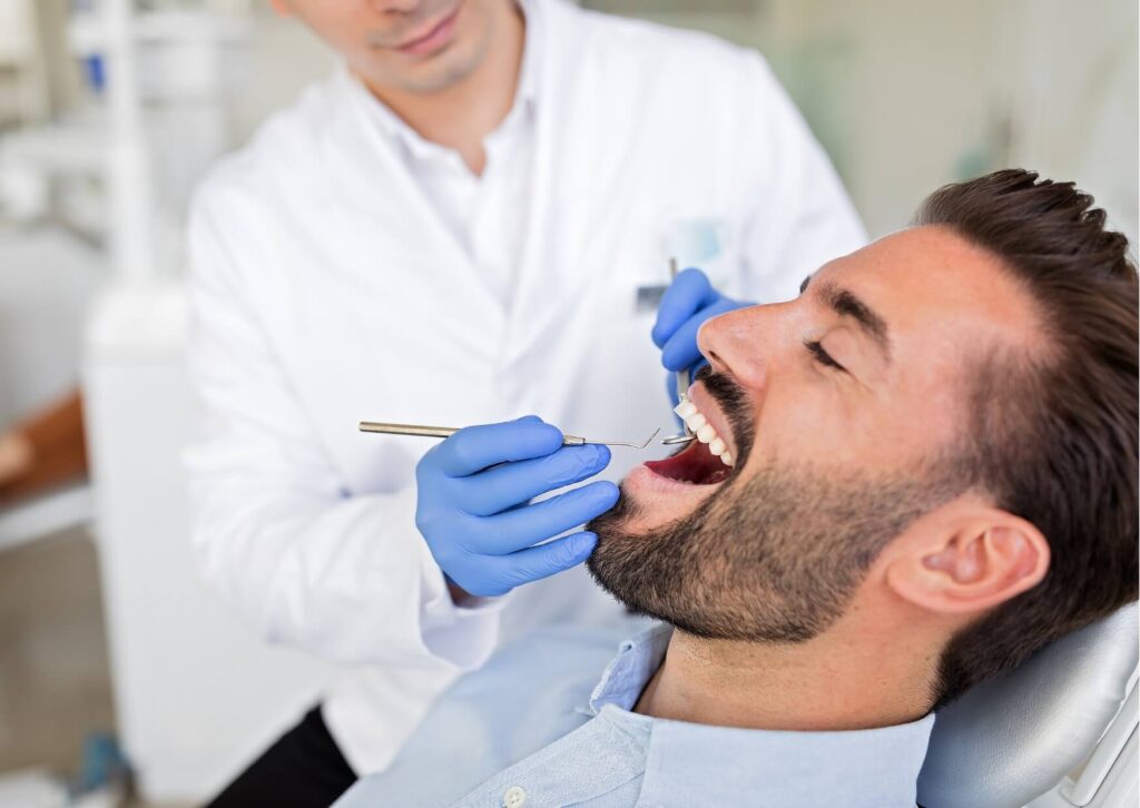 Patient undergoing a dental examination to evaluate a cracked tooth and determine the most appropriate treatment option.