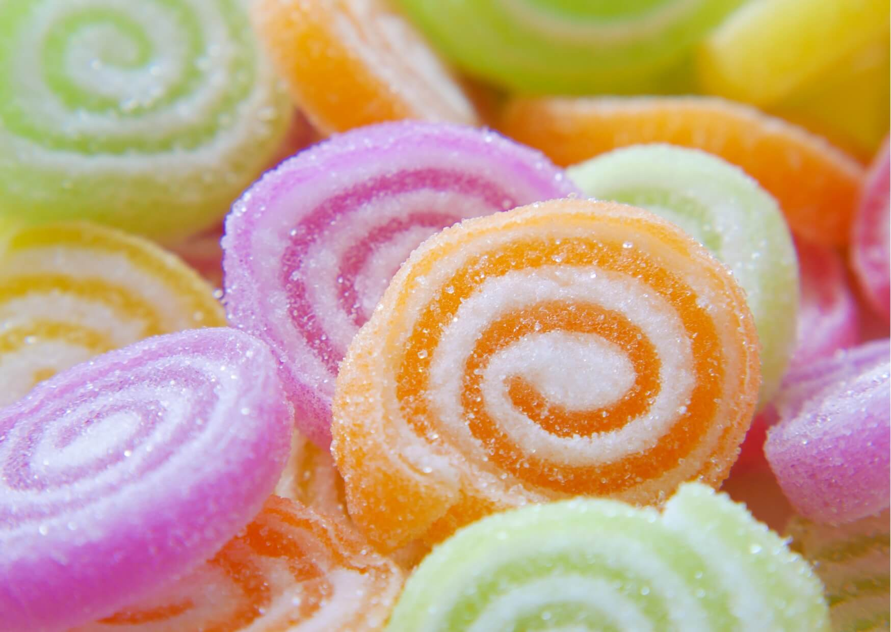 Colorful chewy and sugary candies that can stick to braces and increase the risk of broken brackets and tooth decay.